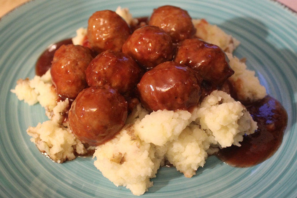 Grape Jelly Meatballs over Mashed Potatoes